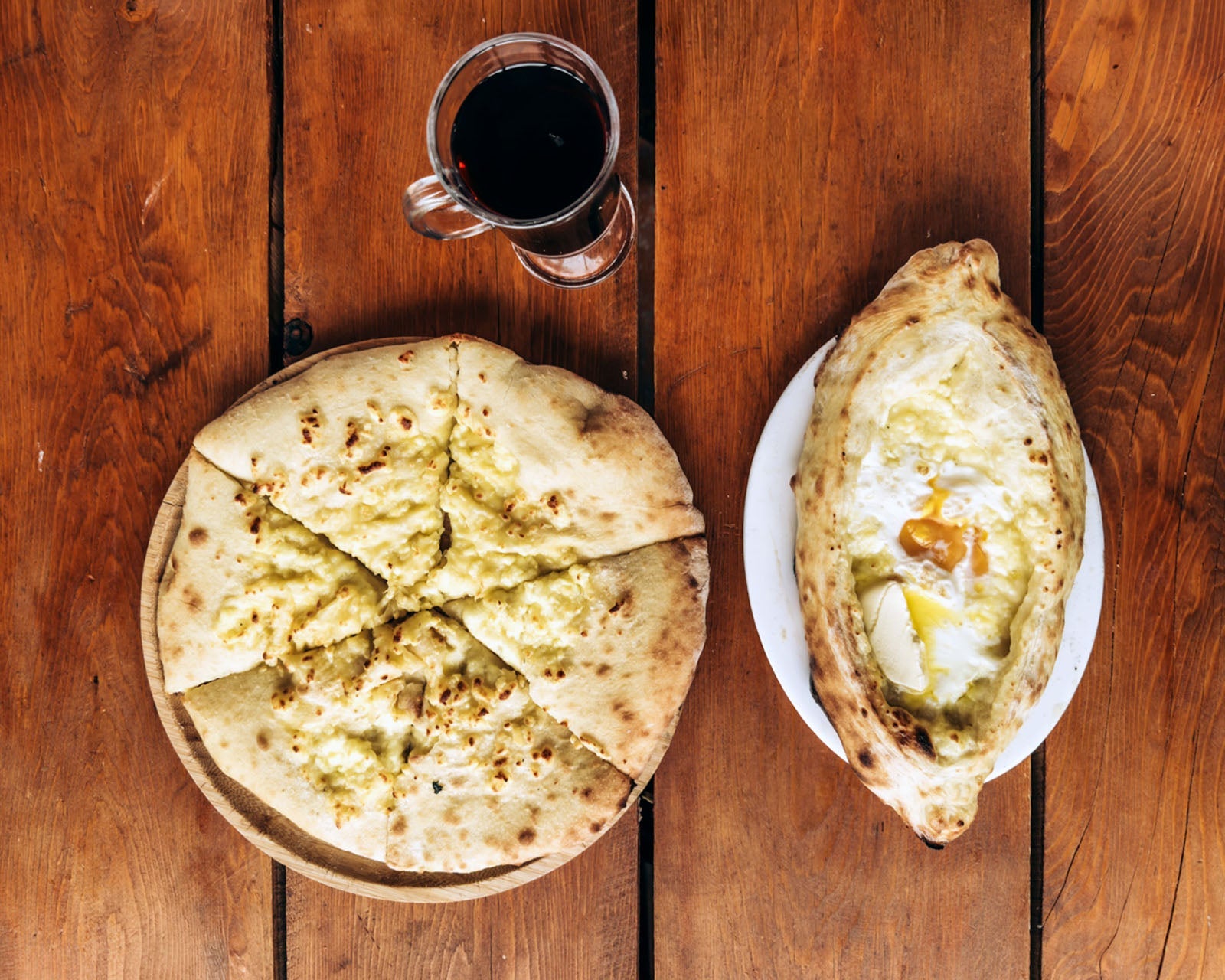  Imeruli Khachapuri and Adjaruli Khachapuri served at Mountain Cafe Bar in Tetnuldi